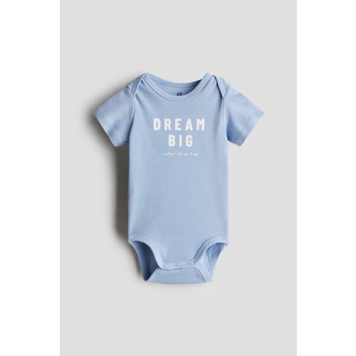 PRINTED BODYSUIT WITH LAP SHOULDERS