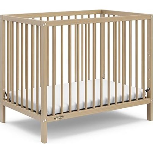Graco Teddi 4-in-1 Convertible Mini Crib with Bonus Water-Resistant Mattress (Driftwood) – GREENGUARD Gold Certified, 2.75-Inch Mattress Included, Convenient Size, Easy 30-Minute Assembly