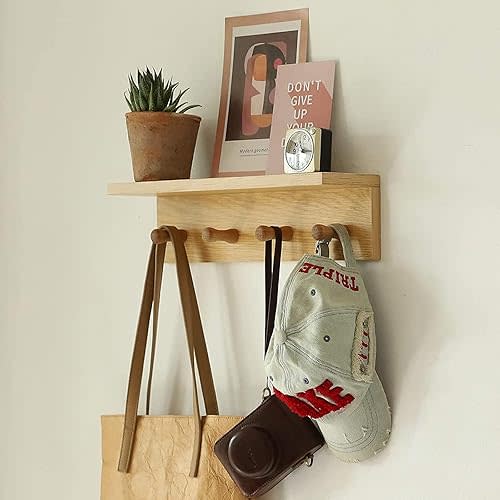 Shelf with hooks for nursery
