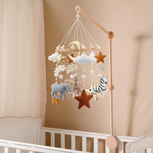 Classic style gender neutral safari mobile for crib with gold stars and leaf detail for a jungle theme nursery