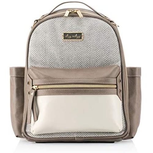 Itzy Ritzy Mini Diaper Bag Backpack – Chic Mini Diaper Bag Backpack with Vegan Leather Changing Pad, 8 Total Pockets (4 Internal and 4 External), Grab-Top Handle and Rubber Feet, Vanilla Latte