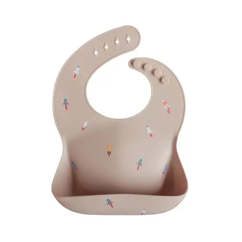 mushie Silicone Baby Bib | Adjustable Fit Waterproof Bibs (Rocket Ship)