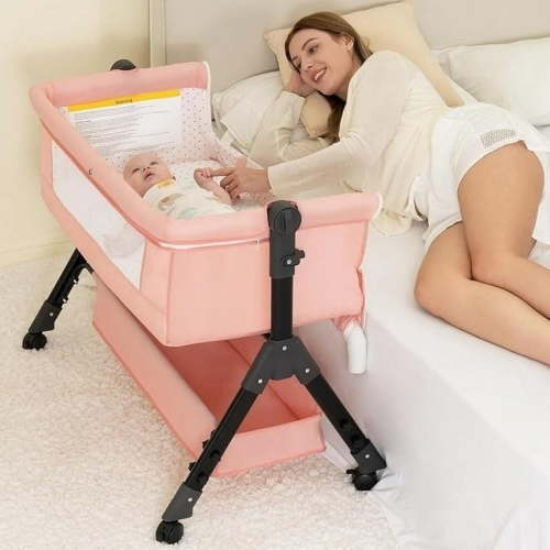 Infant Bassinet Sleeper, Adjustable Bedside Sleeper, Lightweight and Convenient, Comfortable Mattress with Wheels and Storage Basket - Pink