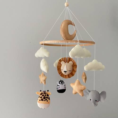 Safari mobile, nursery decor with lion elephant giraffe zebra moon and cloud. Neutral gender baby mobile in brown beige gold color palette