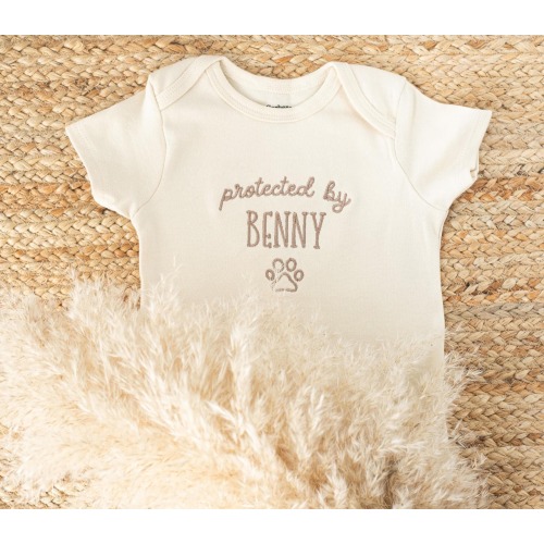 Embroidered Protected By Dog Baby Onesie®: Personalized Newborn Gift for Pregnancy Announcement