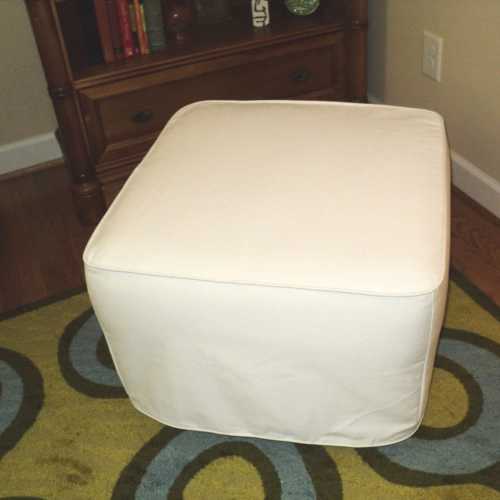 Custom made slipcover for your ottoman from your own fabric.  This one is made to fit Pottery Barn cube companion ottoman