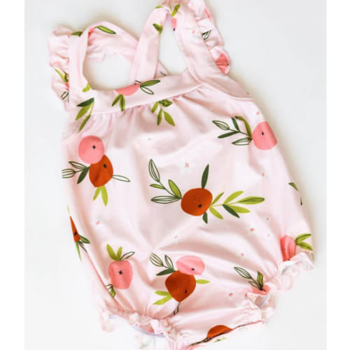 Tangerine Ruffle Cross Back Romper | Mila & Rose