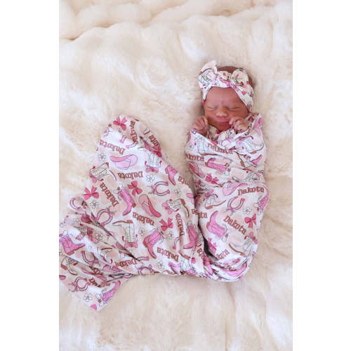 Rodeo Dreams Personalized Swaddle Blanket in Pink | Caden Lane