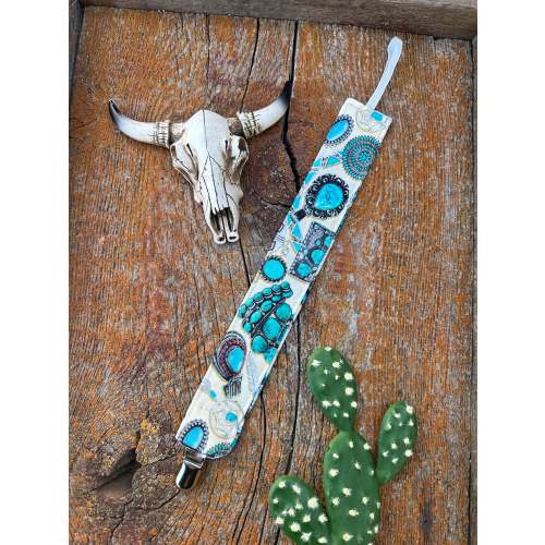 Turquoise loving cowkid pacifier clip
