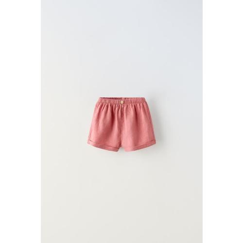 BUTTONED LINEN SHORTS