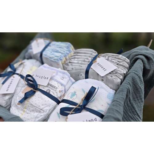 Beautifully Packaged Custom Diaper Sample Set – A Thoughtful Newborn Necessities Gift for New Parents. custom diaper set perfectly packaged