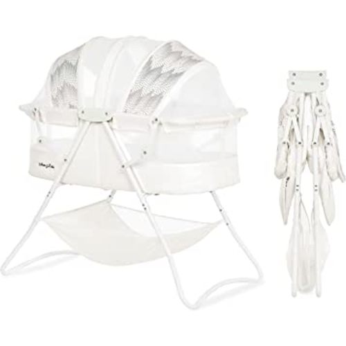 Karley Bassinet in Dove White, Lightweight Portable Baby Bassinet, Quick Fold and Easy to Carry, Adjustable Double Canopy, Indoor and Outdoor Bassinet with Large Storage Basket.