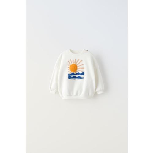 EMBROIDERED SUN SWEATSHIRT