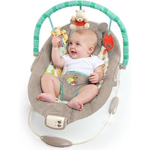 Bright Starts Disney Baby Winnie the Pooh Baby Bouncer Soothing Vibrations Deluxe Infant Seat - Faux Suede, Music, Removable -Toy Bar, 0-6 Months 6-20 lbs (Dots & Hunny Pots)