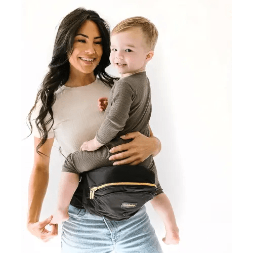 Tushbaby The Original Safety-Certified Hip Carrier for Babies & Toddlers: Machine Washable Child Waist Seat with Pocket Storage, As Seen on Shark Tank (23”-44” waist, 0-3 yrs up to 45lbs) – Black/Gold