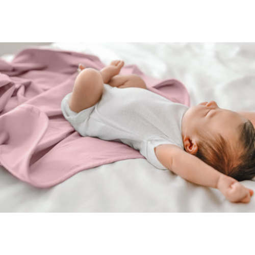 The Ollie® Swaddle in Maunie (pink)