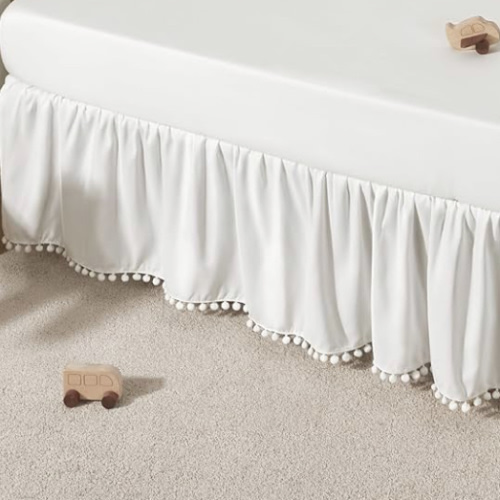 TILLYOU Baby Crib Skirt Girls Boys, Ruffled Bed Skirt with Pompoms, 28”x 52”, 14'' Drop, White