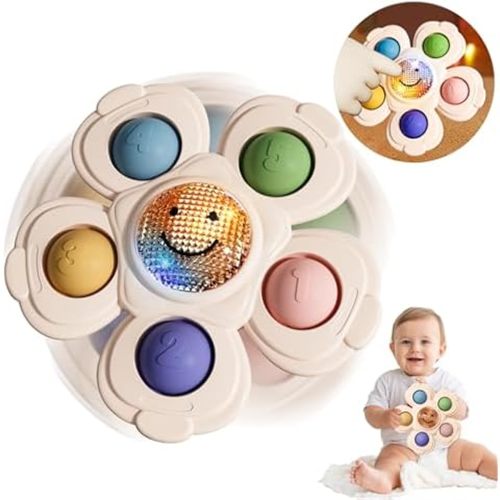 Itzy Ritzy Fidget Toy with Sensory Poppers & Suction Cup; Fidget Toy Sticks to Highchairs, Tables or Tubs While Spinning & Engaging Baby with 4 Textured Poppers, Smile