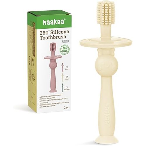 haakaa 360° Baby Toothbrush with Suction Base - Gentle Cleaning for Infant Self-Brushing Training, Food-Grade Silicone, Adjustable Safety Shield - Cream (1 Piece)
