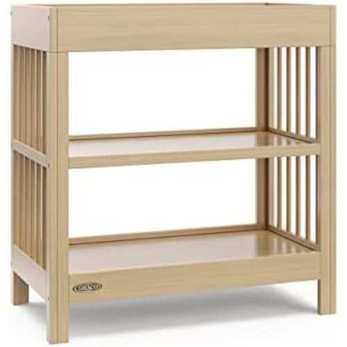 Graco Teddi Changing Table with Water-Resistant Changing Pad (Driftwood) - GREENGUARD Gold Certified, Includes Bonus Water-Resistant Changing Pad with Safety Strap, 2 Shelves, Easy-to-Match