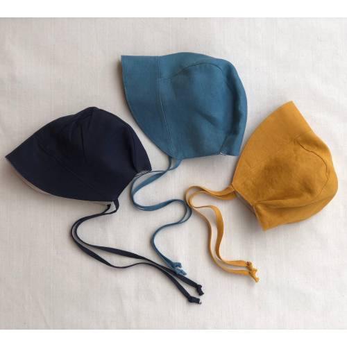 Linen baby and toddler sun bonnet in a range of colours. Unisex