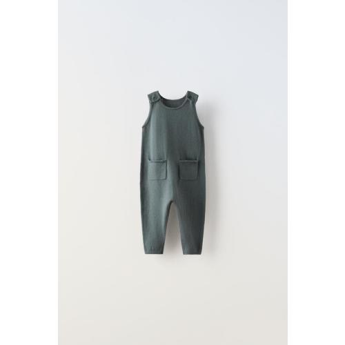 DETAILSOPEN KNIT COTTON SILK JUMPSUITCOTTON AND SILK KNIT POCKET JUMPSUITDENIM POCKET OVERALLS