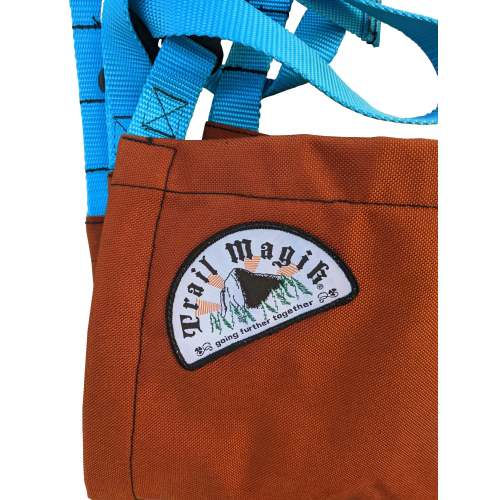 THE HAILEY OUTSIDE KID CARRIER - RUST ORANGE W/ WINTER BLUE STRAPS
