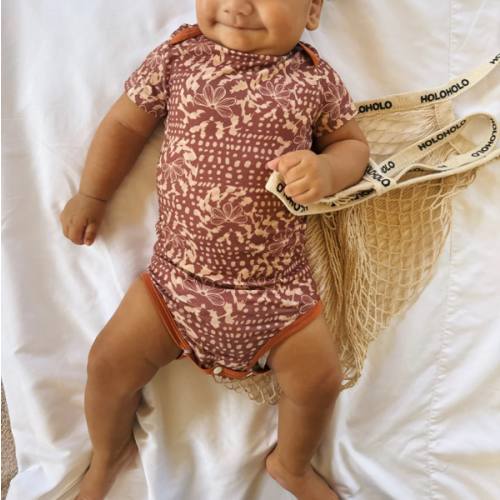 Naupaka shell onesie