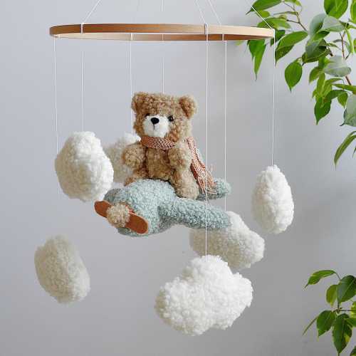 Mobile Teddy Bear from Boucle on an Airplane Boucle Clouds, Airplane Neutral Gender Mobile Children's Decor boucle Mobile Clouds Brown Bear