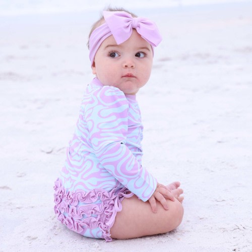 Long Sleeve Rash Guard With Ruffle Bottom | Wavy Days