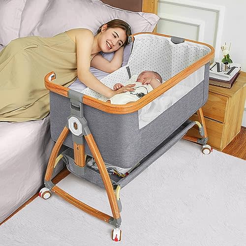 Mereryi Bedside Bassinet for Baby,Baby Bassinet Bedside Sleeper,Bassinet Bedside Sleeper with Wheels,Storage Basket,Mosquito Nets,Easy to Assemble Bassinet for Newborn/Infant,Adjustable Bedside Crib