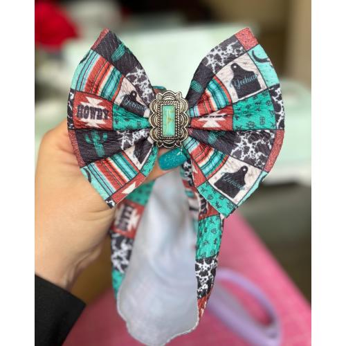 Western bow with charm