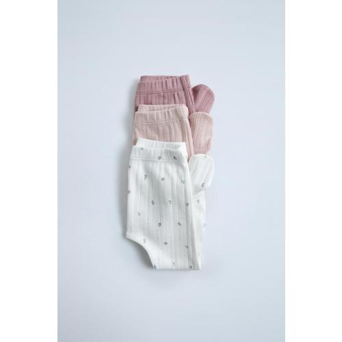 THREE-PACK OF PRINTED FOOTED LEGGINGS