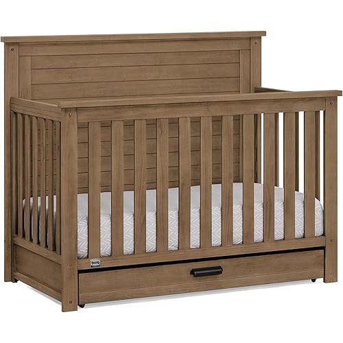 Delta Children Simmons Kids Caden 6-in-1 Convertible Crib with Trundle Drawer, Greenguard Gold Certified, Aged Oak