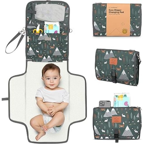 KeaBabies Portable Diaper Changing Pad - Large Waterproof Baby Changing Mat, Compact Travel Diaper Clutch, Functional Pockets Fit Newborn Essentials, Wipeable & Padded Baby Changer (Woods)