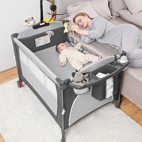 Baby Bassinet Bedside Sleeper,5 in-1 Pack and Play Portable Crib for Baby,Multifunction Bedside Crib from Newborn to Toddlers,Diaper Changer,Playard,Safety Strap,Carry Bag,Hanging Toys