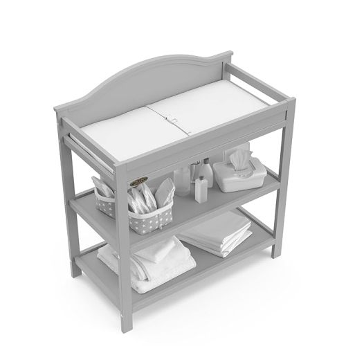 Graco Clara Changing Table (Pebble Gray) - GREENGUARD Gold Ceritifed, Includes Bonus Water-Resistant Changing Table Pad with Safety Strap, 2 Open Shelves