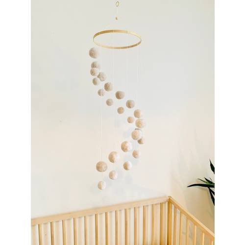 Spiral mobile with pompoms neutral unisex color