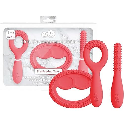 ezpz Oral Development Tools - 3 Months+ (3 Pack in Coral) - Non-Slip Loop, Smile and Stick, 100% Silicone Tools to Practice Feeding + Chewing - Sensory Bumps - Dishwasher Safe