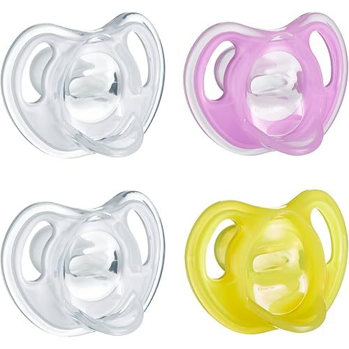 Tommee Tippee Ultra-Light Silicone Pacifier, 6-18 Months, Symmetrical One-Piece Design, BPA-Free Silicone Binkies, Clear/Pink/Yellow, Pack of 4