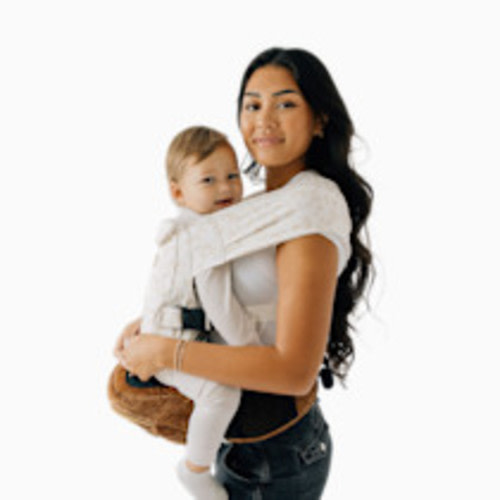 The Tushbaby Hip Carrier in cognac or sable