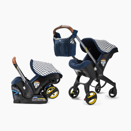 Doona Infant Car Seat with Base & Vacation Essentials Bag- Limited Edition