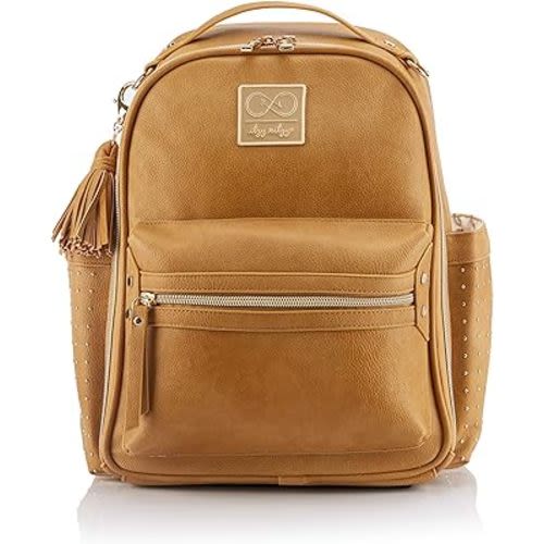 Itzy Ritzy Chelsea + Cole Mini Diaper Bag Backpack - Studded Mini Backpack with Changing Pad, 8 Pockets, Rubber Feet & Tassel - Caramel with Sweetheart Print Interior and Gold Hardware
