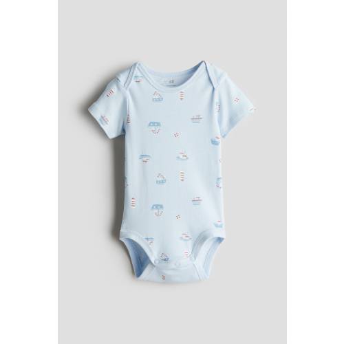 PRINTED BODYSUIT WITH LAP SHOULDERS