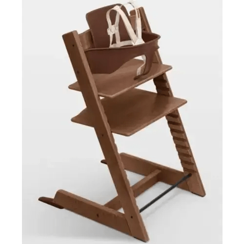 Stokke Tripp Trapp Toddler High Chair: Adjustable High Chair | Oak Warm Brown chair with warm Brown seat with beige harness