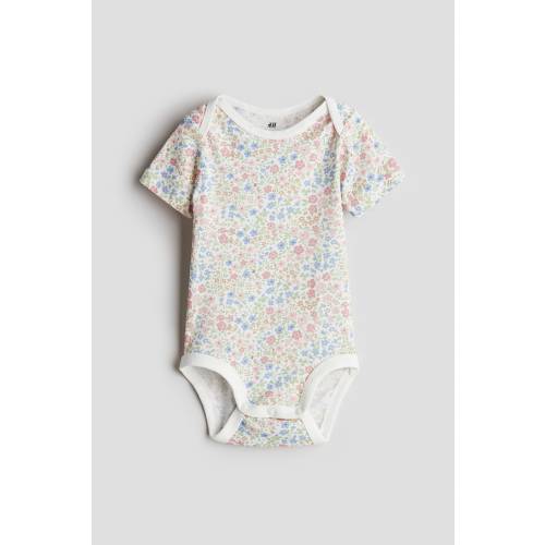 PRINTED BODYSUIT WITH LAP SHOULDERS