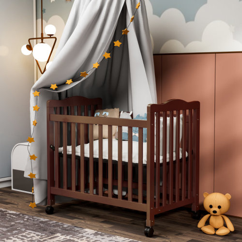 Harriet Bee Hinojosa Mini Crib With 3 Position Adjustable Mattress Board & Reviews | Wayfair
