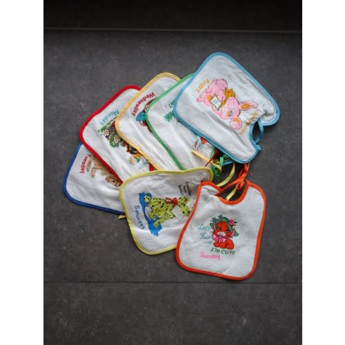 70.s vintage Vintage 70's bibs week 7 days plasticized on backside terry fabric front new from deadstock