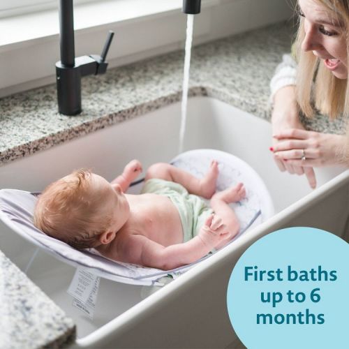 The First Years Sure Comfort Folding Baby Bather – For Sink or Tub Use: Newborn Sling, Sturdy Hook, Fits Kitchen Sinks