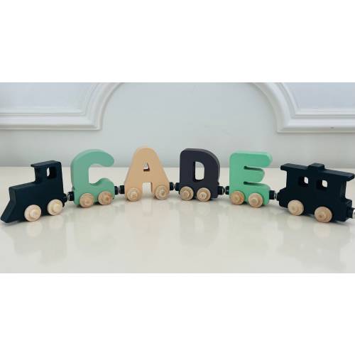 Build your own Train with our Sage Beige colors. Personalized Wooden Magnetic Alphabet Letters. Engine and Wagon Included.
